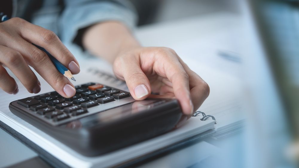Accountant working through calculations