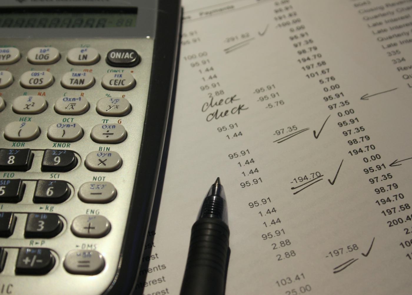 A ledger checked and ticked by an accountant